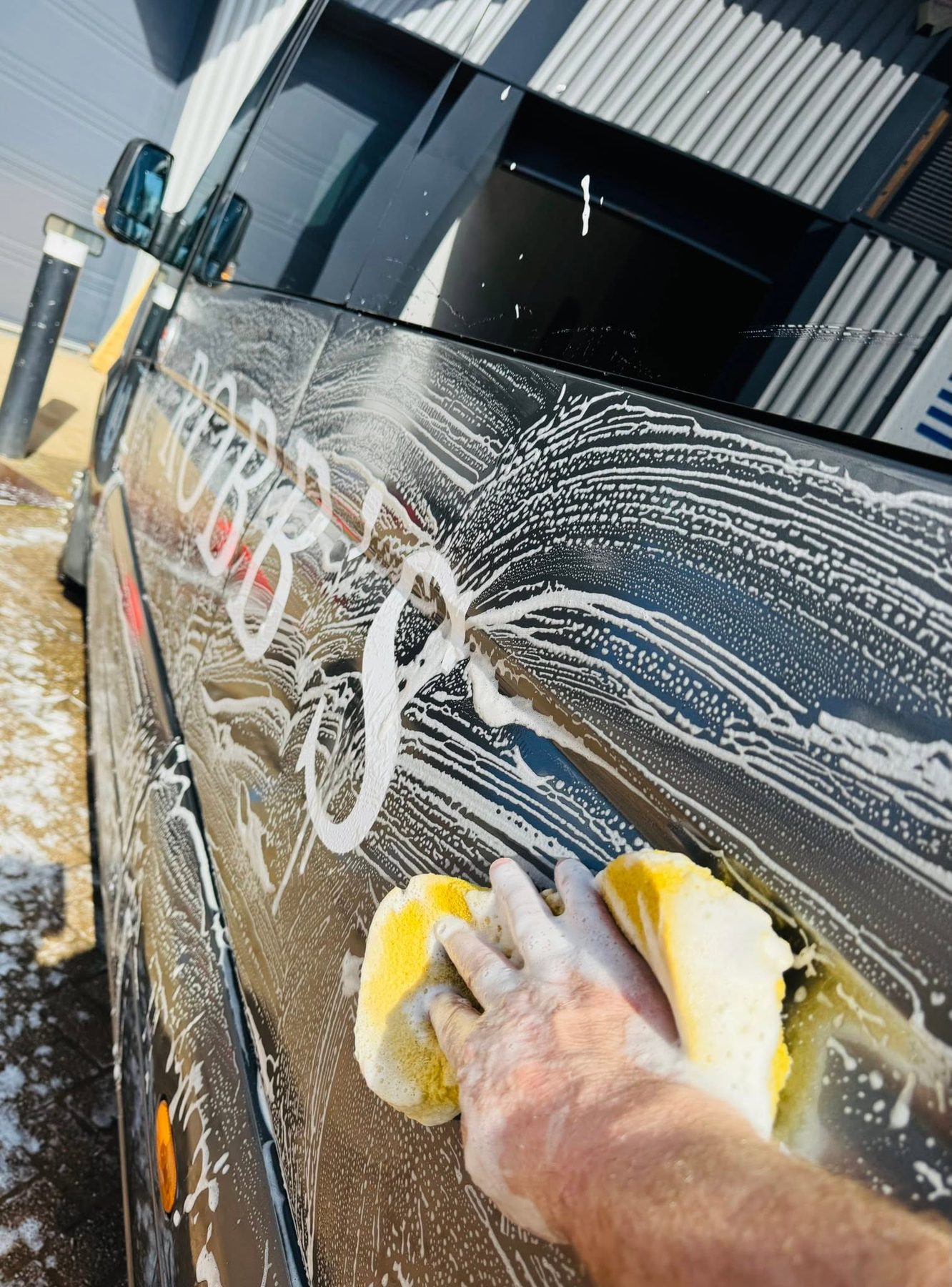 Hand-washing a Robb's vehicle